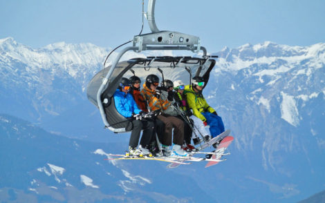 People on the ski lift in the Italian Alps